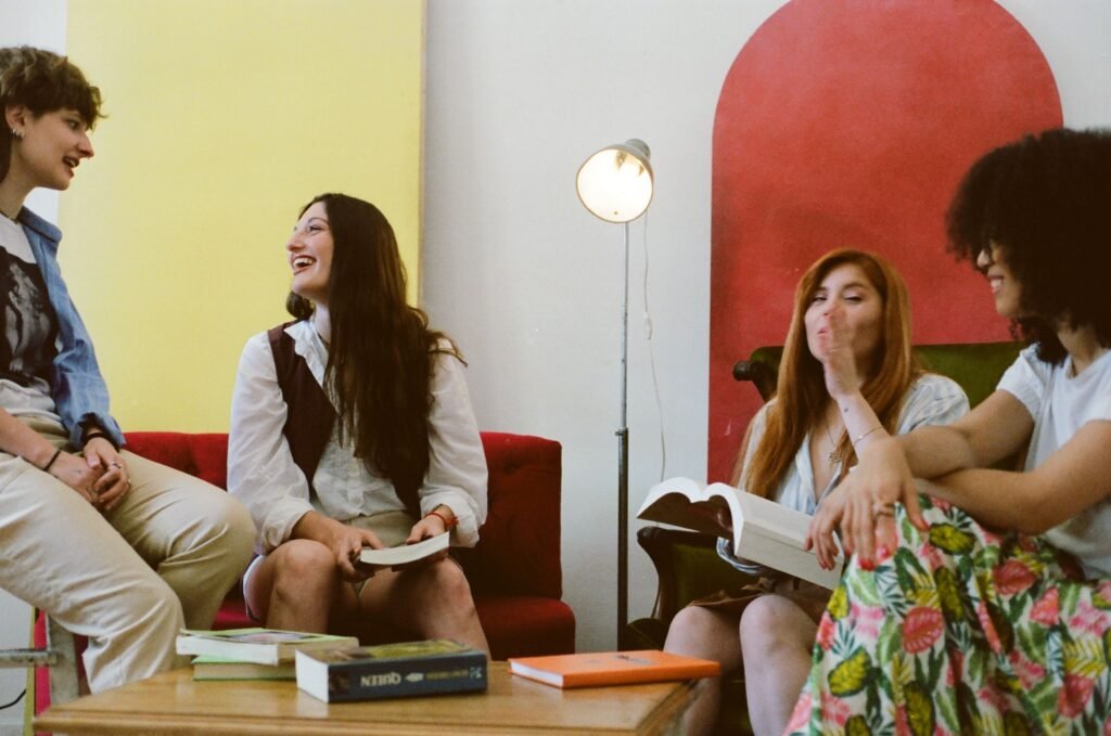 Friends at a book club symbolizing structured activities for social connection