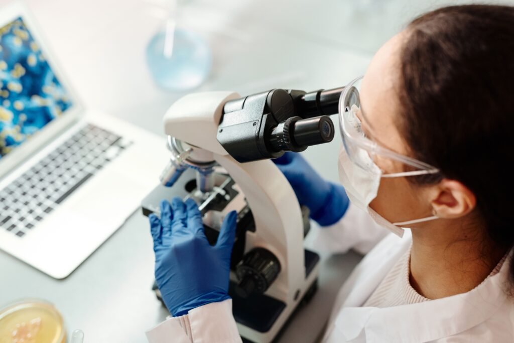 Scientist analyzing blood samples for immune cell research