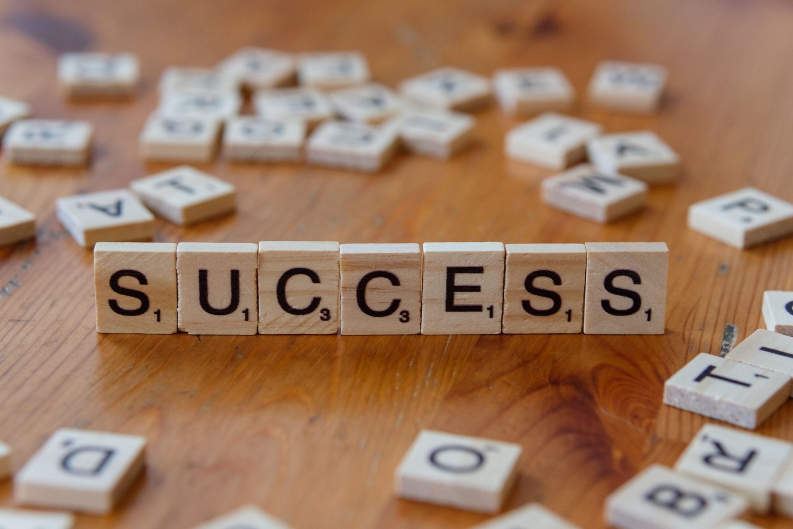 Smart habits of successful people represented by wooden success tiles