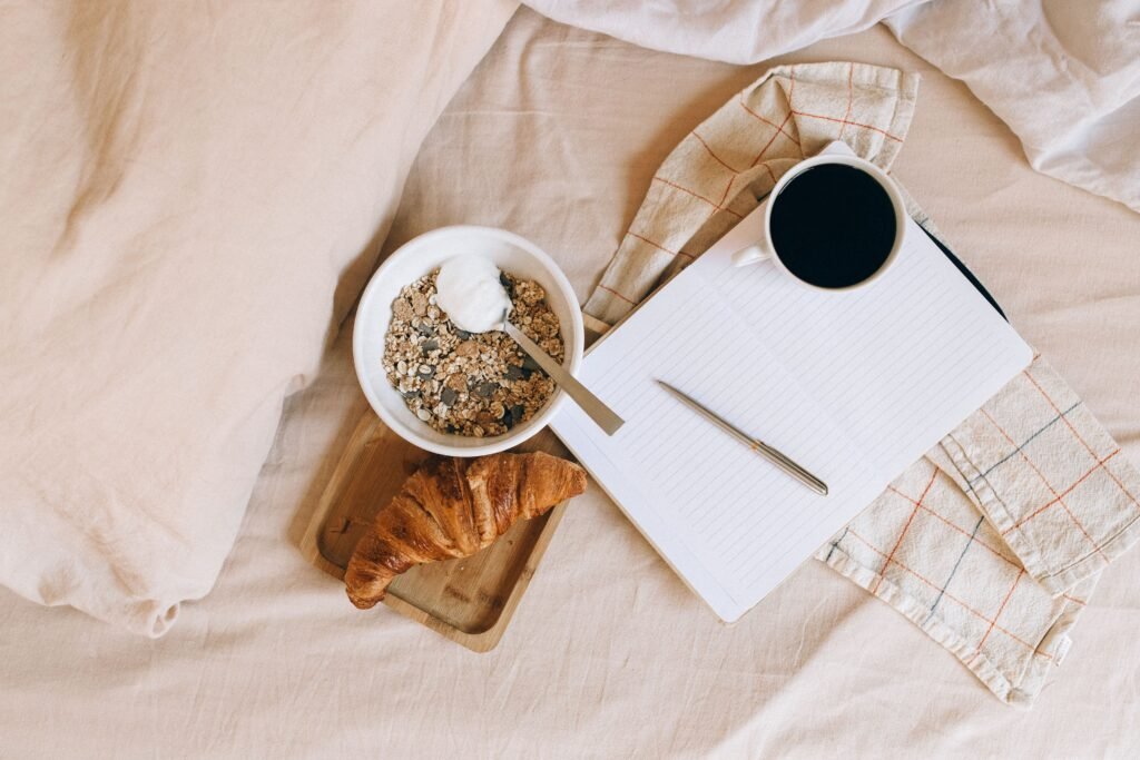 Morning routine with journal and coffee for building smart habits